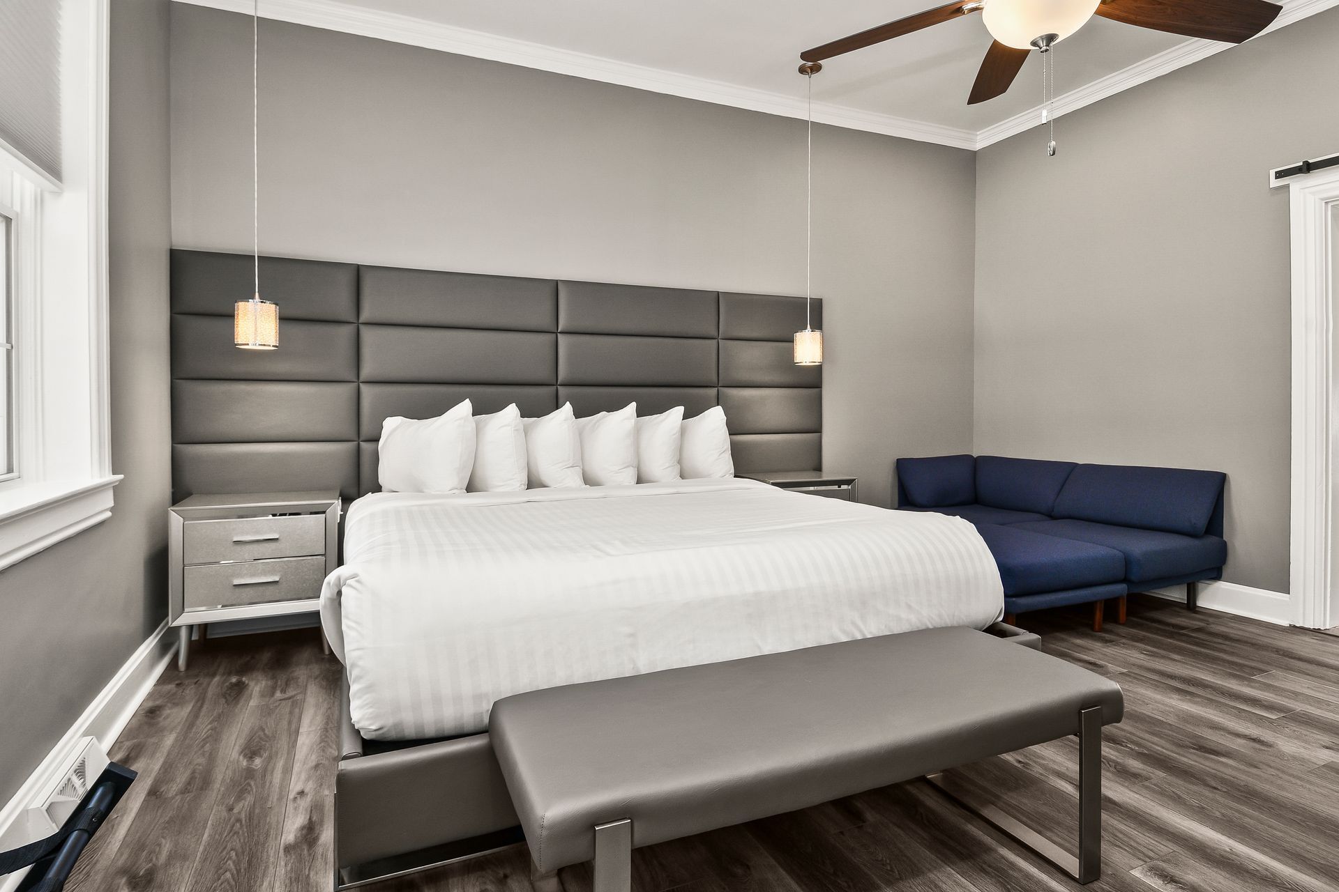 A Captain Wohlt Inn guest room with a king bed