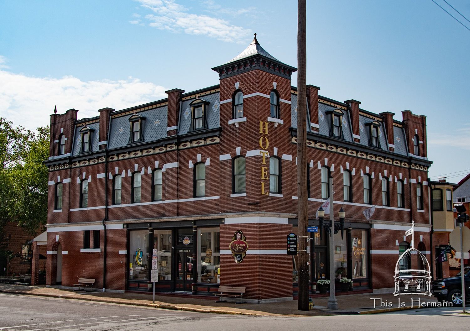 The red brick Hermann Crown Suites building on Market Street