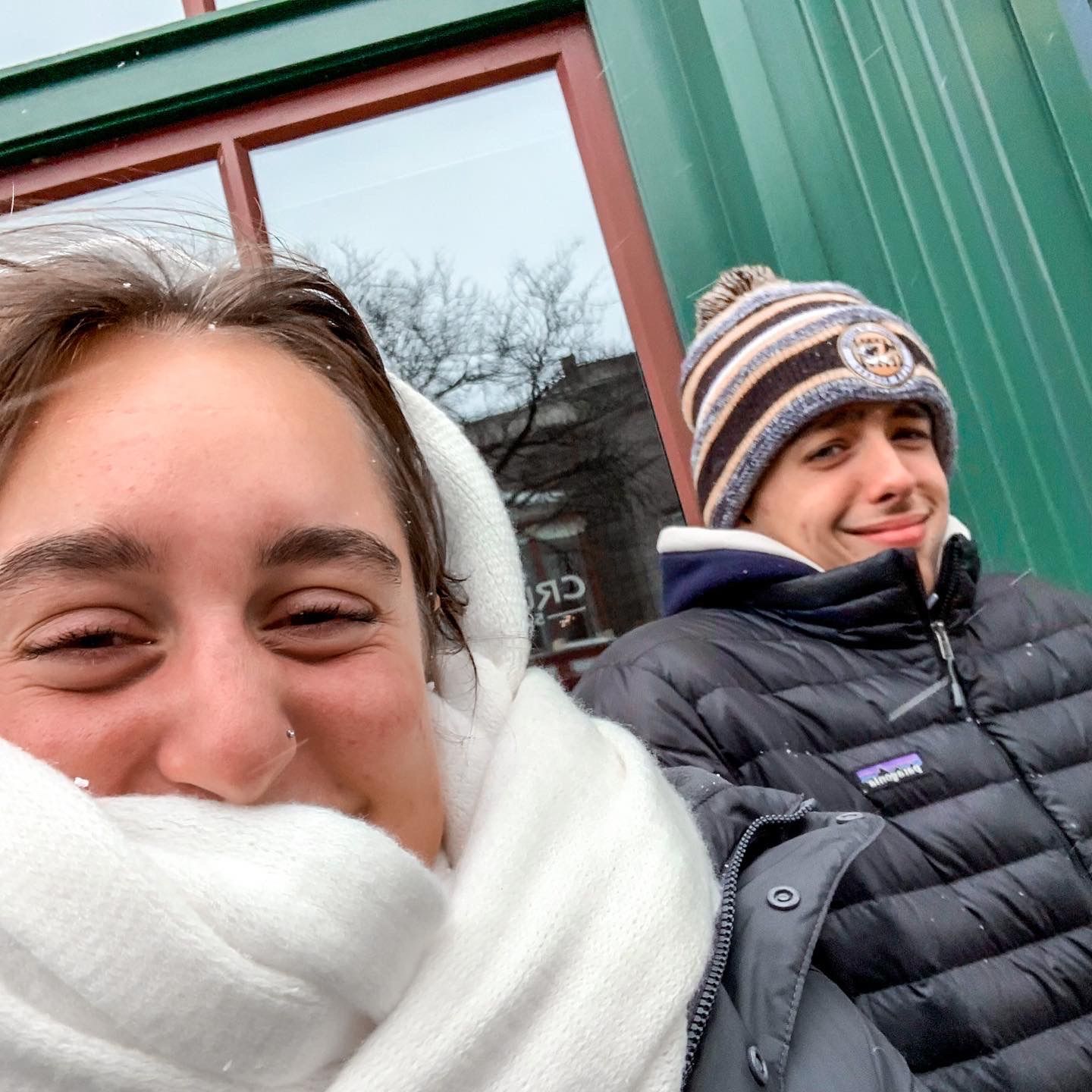 A selfie of Andrew and Grace bundled up in a winter hat and scarf